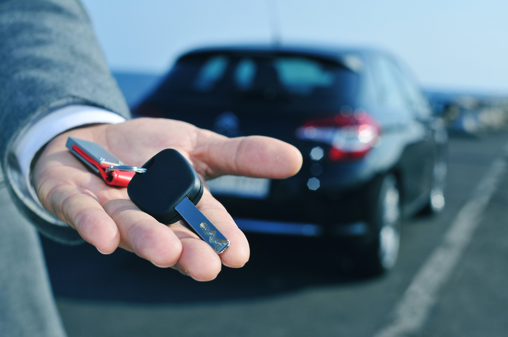 company car keys being handed over